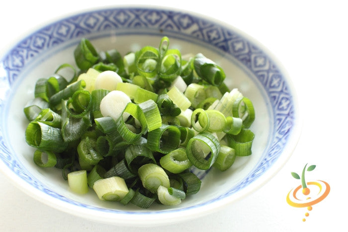 Bowl of chopped green spring onions from Onion Evergreen seeds