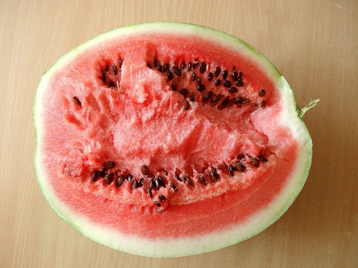 Red-flesh Watermelon seeds from SeedsNow featuring moon and stars design for planting and gardening.